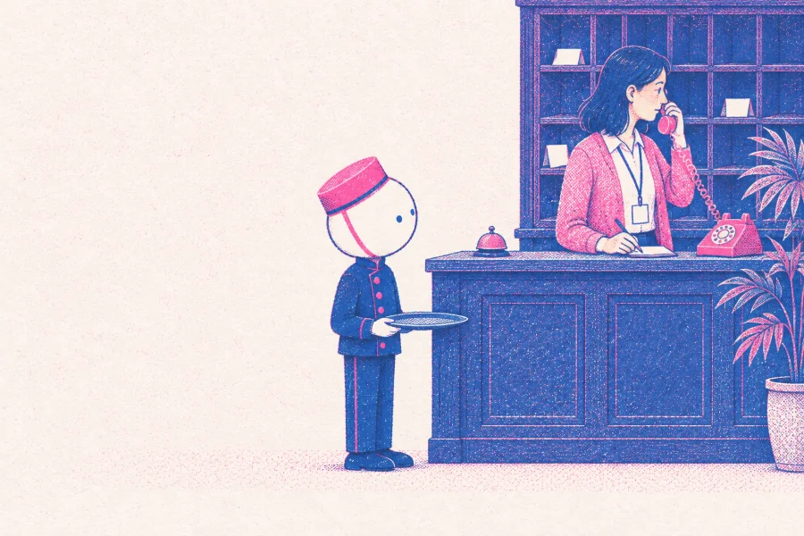 A small hotel front desk used as an office: a woman in a cardigan and lanyard makes the call on an old pink telephone, while the page waits by the desk with its empty tray.